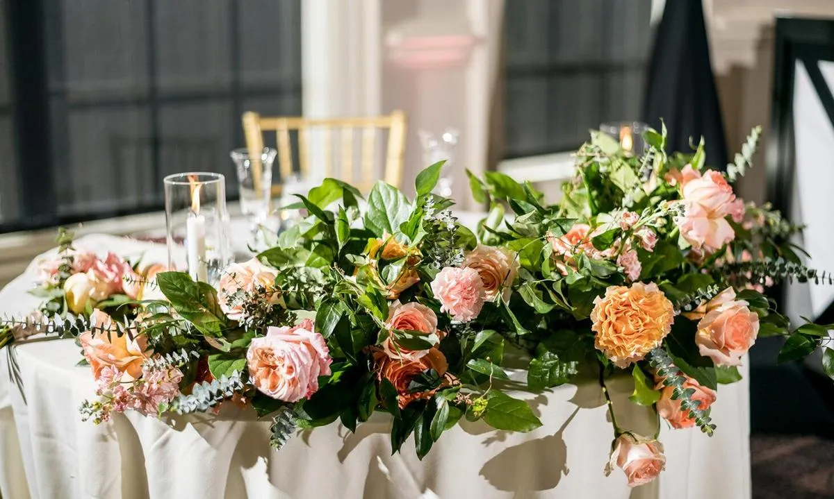 Elegant Outdoor Wedding Ceremony Setup and Floral Arch